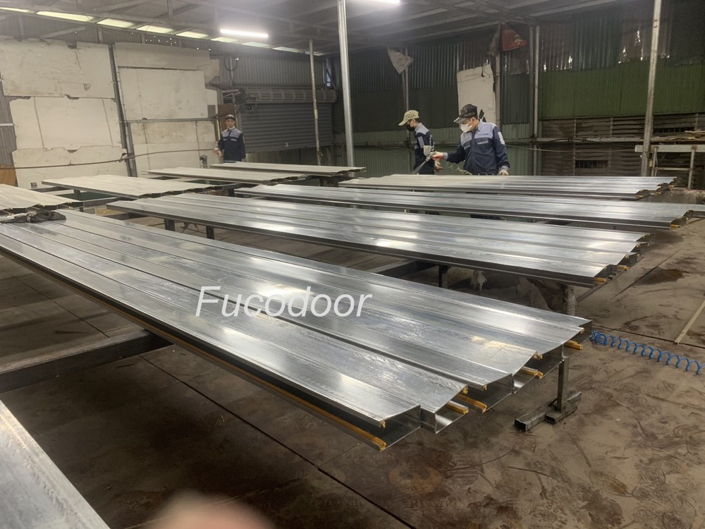 Cửa cuốn siêu trường thép mạ màu dầy 0.9ly
