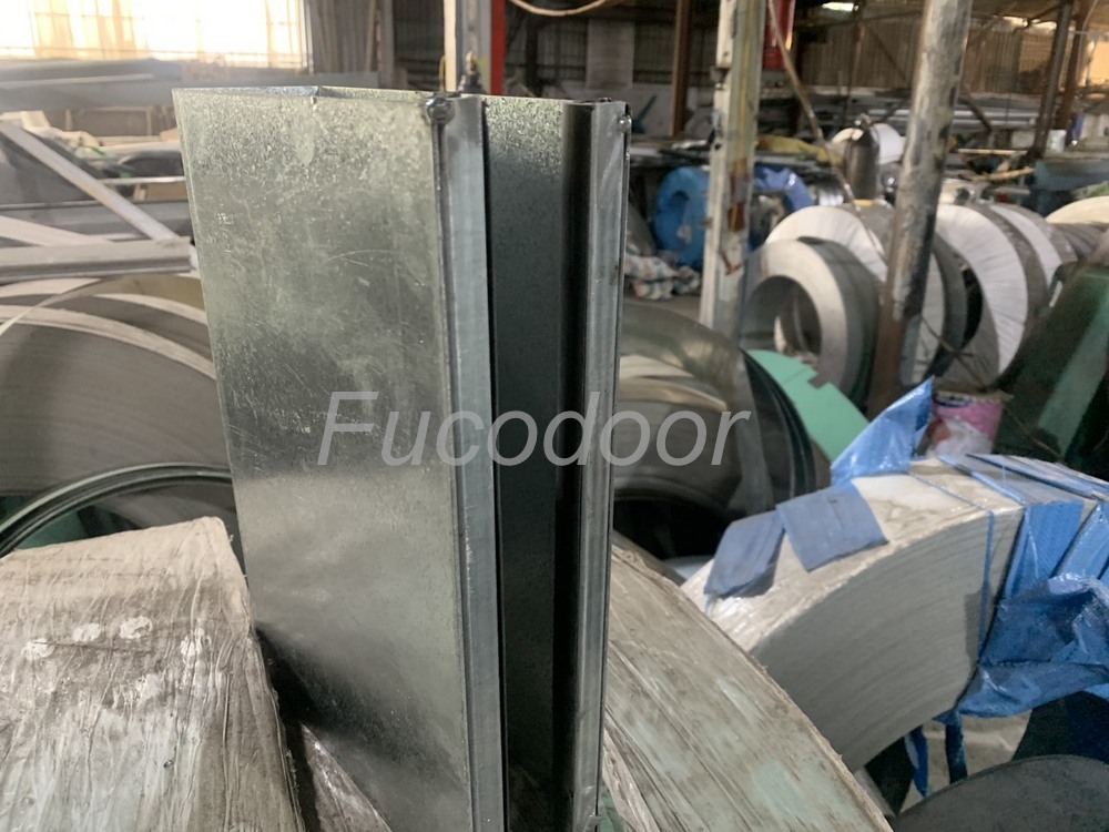 Cửa cuốn siêu trường sơn tĩnh điện dầy 1.4ly, ray bản 200mm, 150mm, có zoong giảm chấn Fucodoor