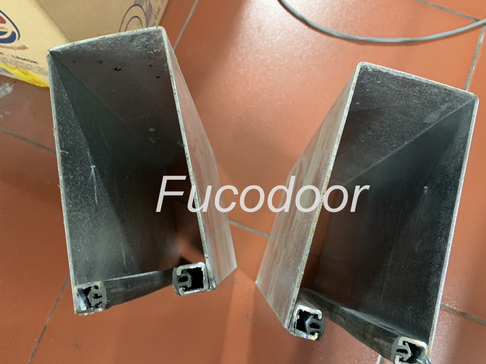 Cửa cuốn siêu trường sơn tĩnh điện dầy 1.4ly, ray bản 200mm, 150mm, có zoong giảm chấn Fucodoor