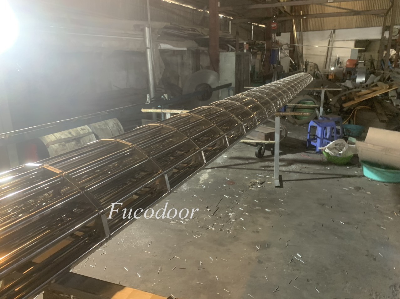 Nhà máy cửa cuốn song ngang ống tròn INOX phi 19