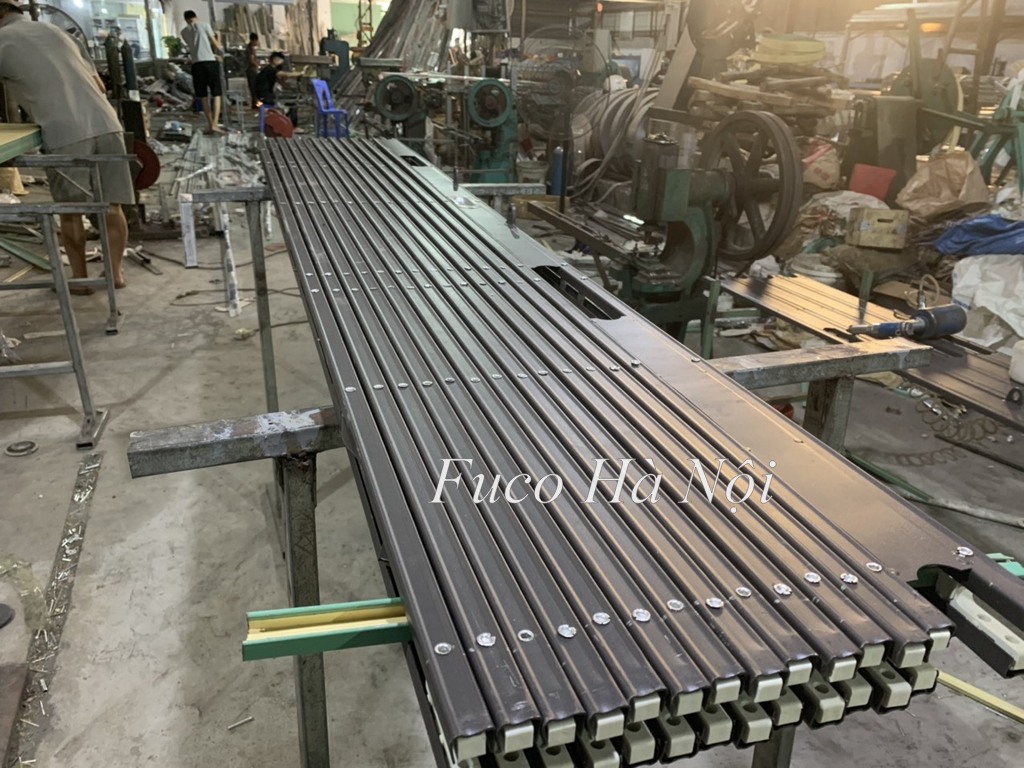 Cửa xếp thang máy